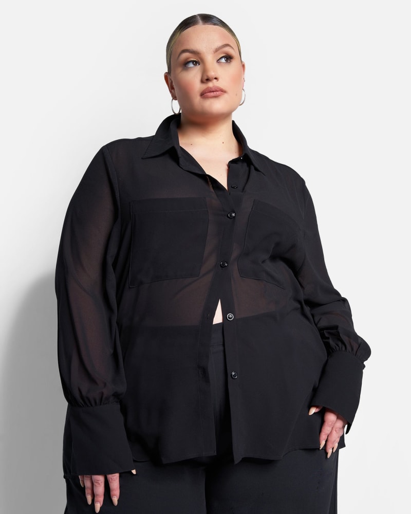 Side of a model wearing a size 3X Sign Here Sheer Button Up Blouse - Black in Black by Rebdolls. | dia_product_style_image_id:321578